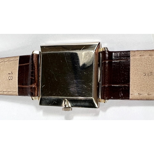 617 - OMEGA: a c.1962 manual watch with square black dial, silver hands and batons, stamped 14K GOLD (whit... 