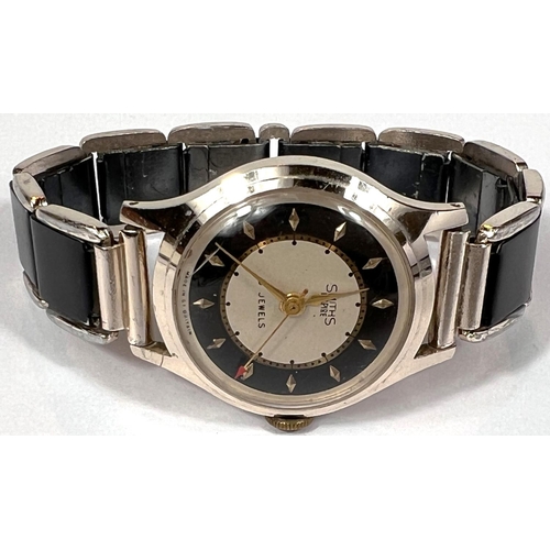 618A - SMITHS EMPIRE: a vintage c.1950's manual watch with black and cream dial, gold hands, seconds hand a... 