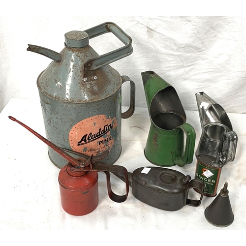 62 - A collection of vintage oil cans:  Aladdin; Singer; Halfords; etc.