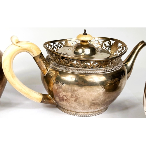 621 - A hallmarked silver 4 piece tea set of baluster form with pierced rims and gadrooned borders, ivory ... 