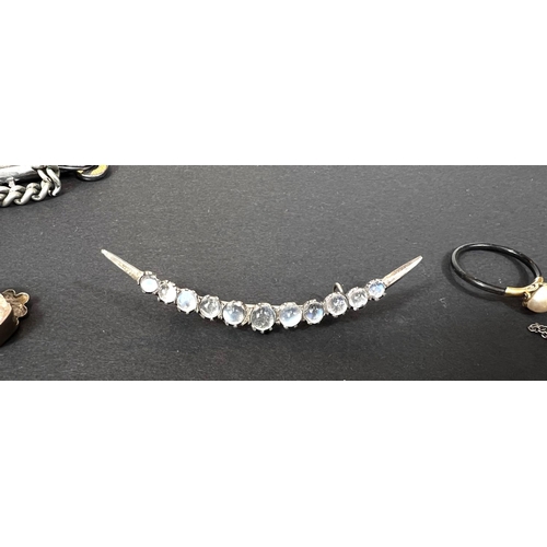 667 - Five unusual tooth shaped white metal weights with oriental marks; a white metal watch chain; diaman... 