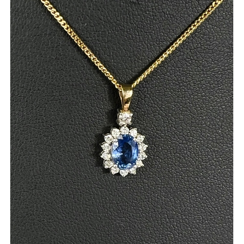 668 - A sapphire and diamond pendant, central sapphire surrounded by diamonds on 18k gold chain 4.7gms