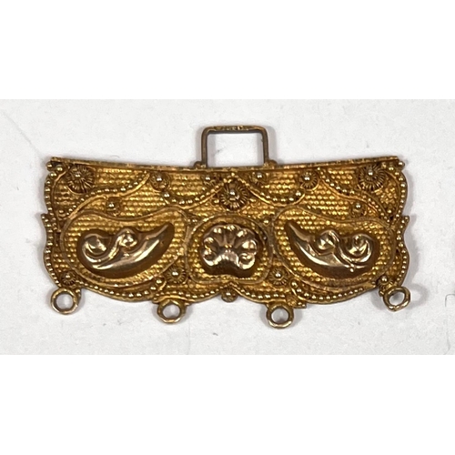 720 - A Victorian yellow metal filigree buckle, unmarked, tests as circa 18ct, 3gm