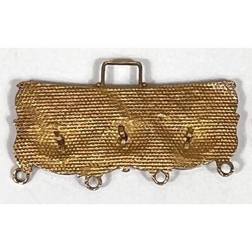 720 - A Victorian yellow metal filigree buckle, unmarked, tests as circa 18ct, 3gm