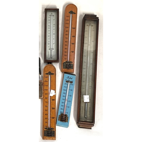 73 - A collection of thermometers; slide rules; etc.