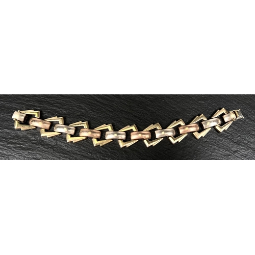 740 - A modern 3 colour gold bracelet with geometric links, 9 carat, 31.9gm