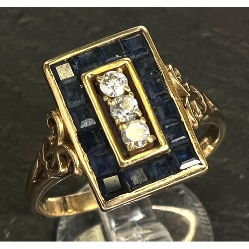 742 - An Art Deco dress ring set 3 diamonds and pave set border of square sapphires, 18 carat gold shank