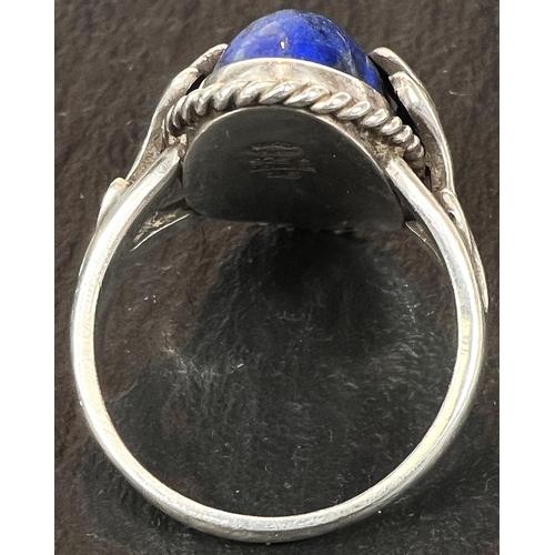 763 - Georg Jensen:  a silver dress ring set oval cabochon lapis lazuli. Size T