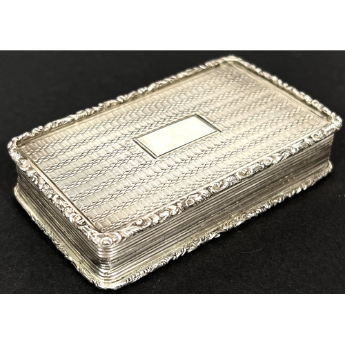 771 - An early Victorian silver snuff box, rectangular form with repousse border, gilt interior, engraved ... 