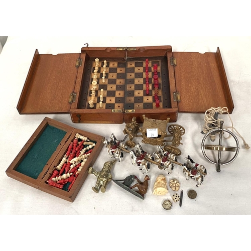 79 - A model of QEII Coronation carriage; 2 travelling chess sets in wooden cases; toys; etc.