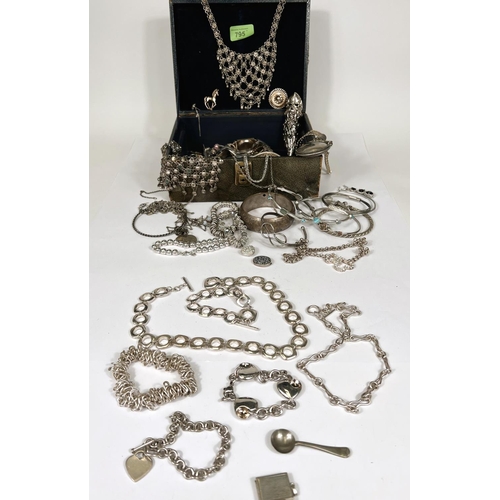 795 - A vintage jewellery box with contents, white metal jewellery including silver necklaces and bracelet... 