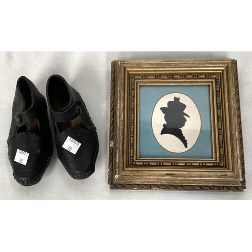 80 - A pair of 19th century child's clogs; a silhouette, female head and shoulders, framed and glazed