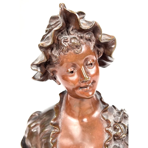 830 - Art Nouveau style bronze:  half length bust of a young woman in bonnet, signed S. Kinsburger, height... 