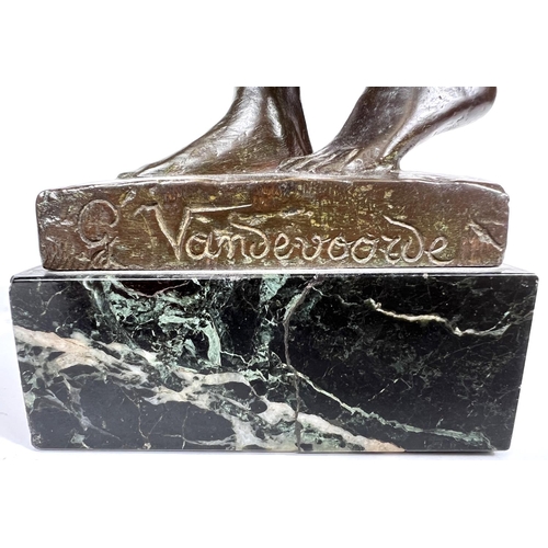 831 - Van de Voorde (1878-1970):  bronze female nude standing holding her neck, on marble base, signed, he... 