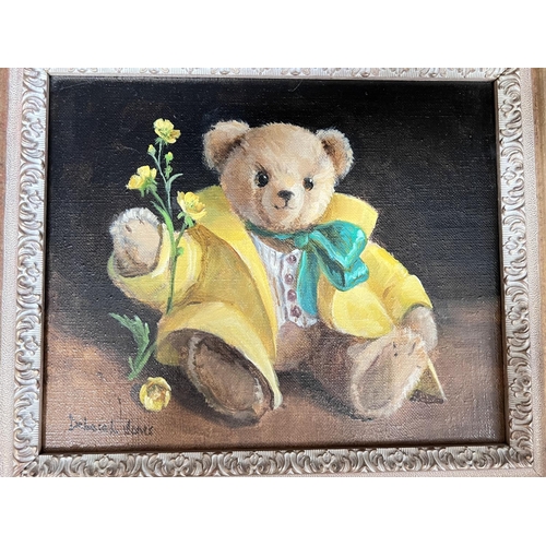 860 - Deborah Jones (1921 - 2012) Teddy bears with flowers, 2 oil on canvas, signed 19 x 24cm