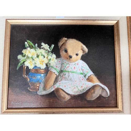 860 - Deborah Jones (1921 - 2012) Teddy bears with flowers, 2 oil on canvas, signed 19 x 24cm