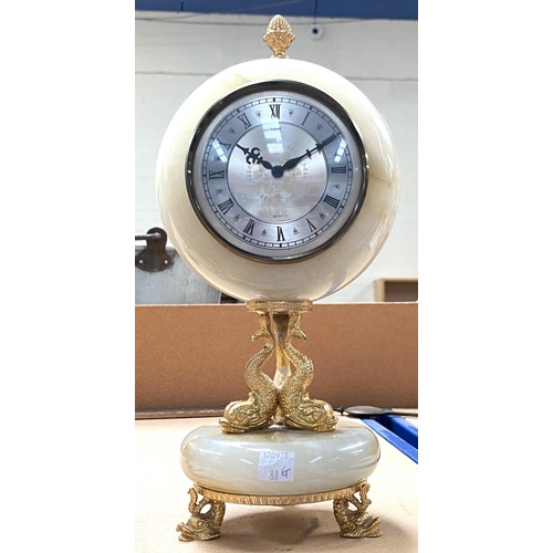 88G - A modern quartz onyx gilt mantle clock