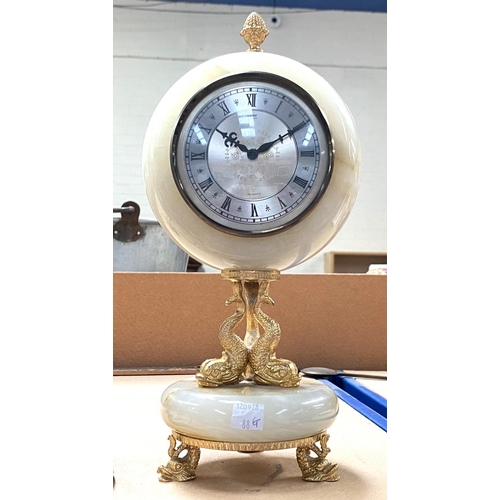 88G - A modern quartz onyx gilt mantle clock