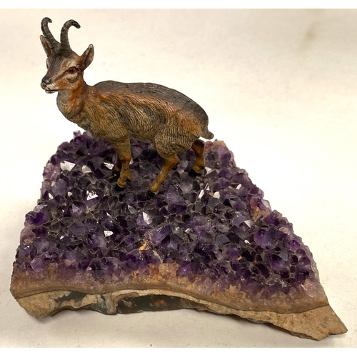 90 - A cold painted mountain goat on base of amethyst crystal sample, length 11.5cm