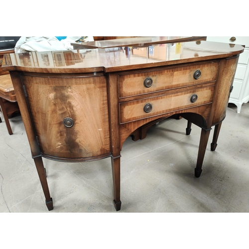 925 - A George III style sideboard of 2 cupboards and 2 drawers in crossbanded mahogany