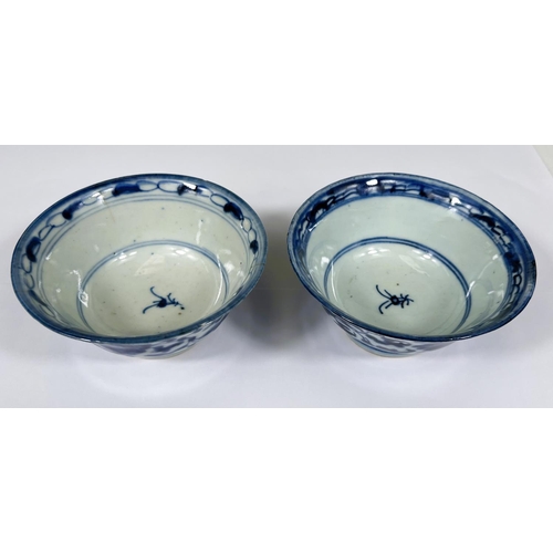 411 - A pair of Chinese 18th century blue and white bowls with floral decoration both with square seal mar... 