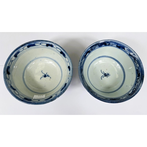 411 - A pair of Chinese 18th century blue and white bowls with floral decoration both with square seal mar... 