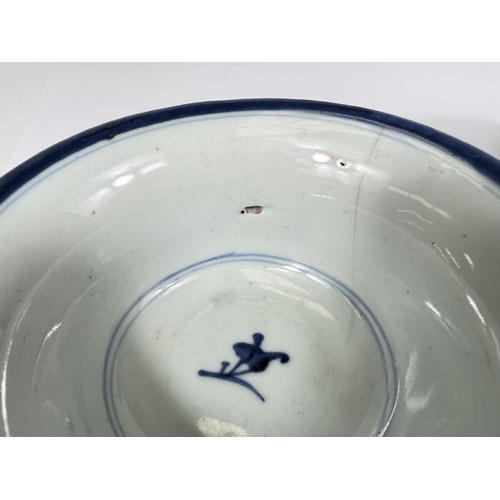 412 - A Chinese 18th century blue and white bowl, floral decoration, square mark to base, dia. 9.5cm; Two ... 