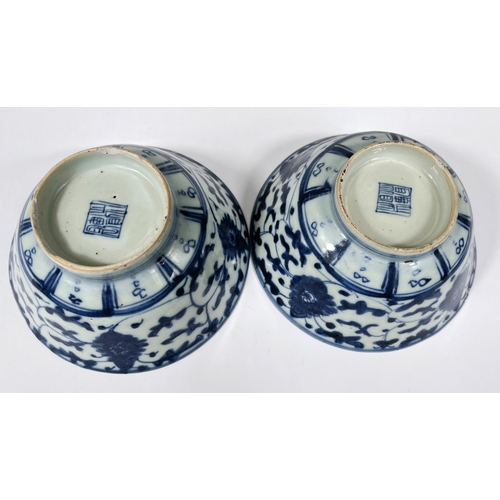 413 - Two Chinese 18th century blue and white bowls with floral decoration, square seal mark to base 14cm ... 