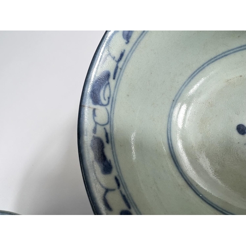 414 - Two Chinese 18th century blue and white bowls with floral decoration both with square seal marks to ... 