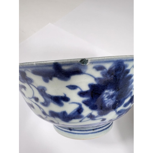 414 - Two Chinese 18th century blue and white bowls with floral decoration both with square seal marks to ... 