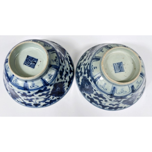 414 - Two Chinese 18th century blue and white bowls with floral decoration both with square seal marks to ... 