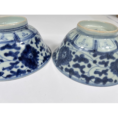 414 - Two Chinese 18th century blue and white bowls with floral decoration both with square seal marks to ... 