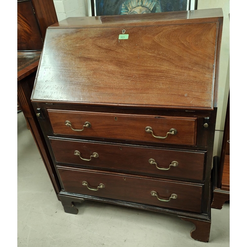 923 - A Georgian style mahogany bureau with fall front and 3 drawers under