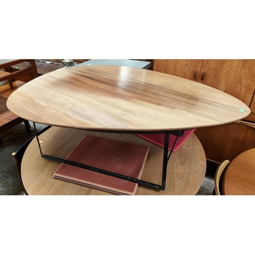 965 - A large mid 20th century pebble shaped teak table with wrought metal base