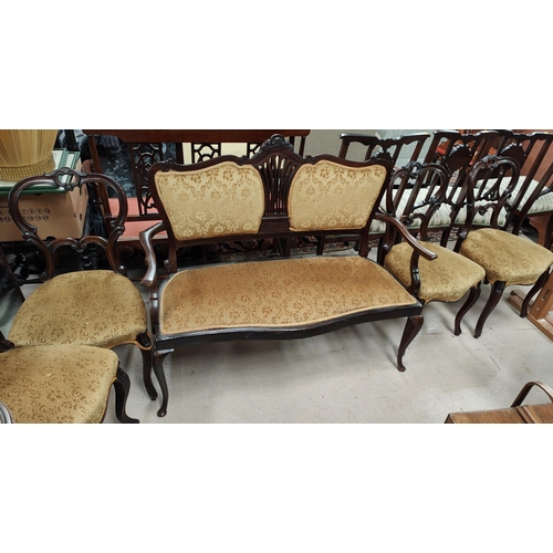 982 - A 19th century walnut part salon suite comprising two seater settee and four chairs, gilt floral bac... 