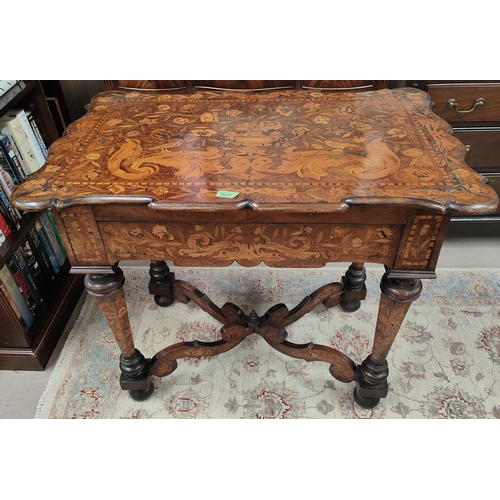 984 - An 18th century Dutch marquetry shaped rectangular table with frieze drawer, hexagonal tapering legs... 