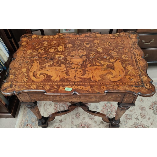 984 - An 18th century Dutch marquetry shaped rectangular table with frieze drawer, hexagonal tapering legs... 