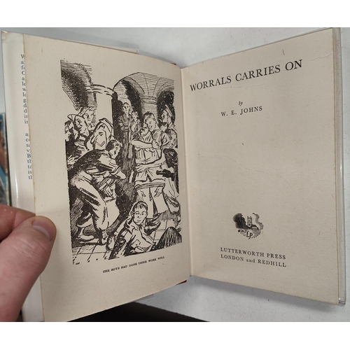 352 - CAPTAIN W.E. JOHNS: Four Worrals first edition novels published by Lutterworth Press, 'Worrals Flies... 