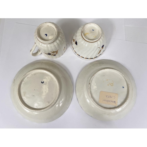 545 - A First Period Worcester trio set:  tea bowl; coffee cup and saucer, in blue and gilt, crescent... 