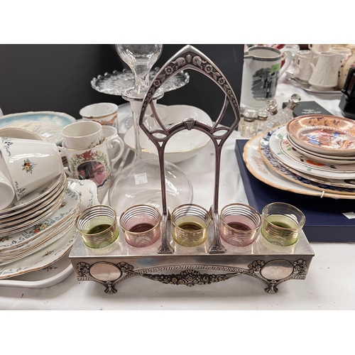 556 - A 5-hole glass holder in WMF style silver plate; a china floral part tea set; glassware; decora... 