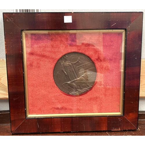 112 - A framed pair of WWI medals awarded to Harold Joseph Cook with framed death plaque 