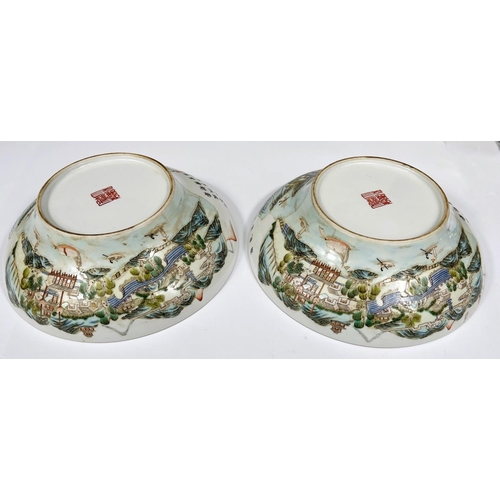 441 - Two Chinese porcelain bowls with matching polychrome decoration of river and mountain scenes with te... 