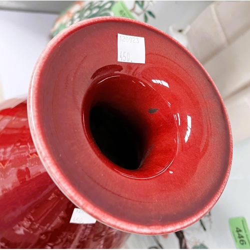 450 - A Chinese Oxblood glazed vase with bulbous body, flared rim, associated stand, ht. 35cm incised mark... 