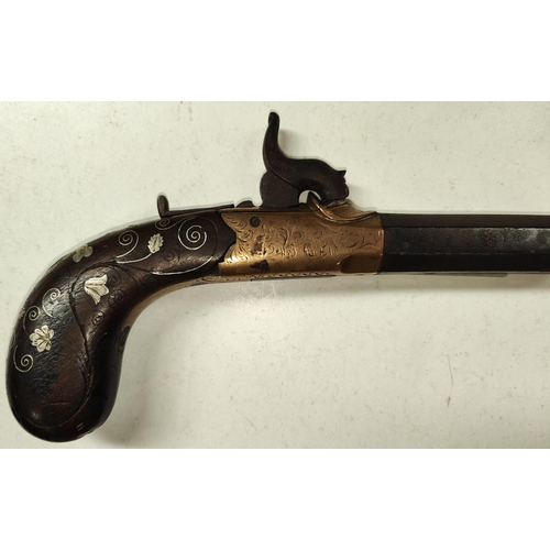 68 - A percussion cap muss pistol with octagonal barrel and silver filigree line inlay; a trench art bras... 