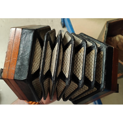 284 - A 19th century concertina by Lachenal, 10 buttons to each end, with fretwork back and front, origina... 