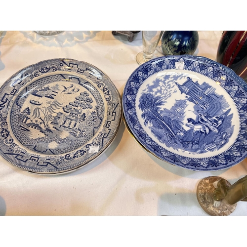 557 - A selection of blue and white plates