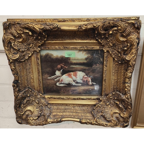 107 - A large gilt framed 19th century style textured print of Spaniels; another similar picture in gilt f... 