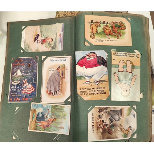 113 - A late 19th/early 20th century postcard album with various cards and ephemera