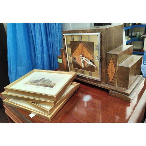 175 - An Art Deco walnut cased clock with chromed hands, Arabic numerals and four framed prints 