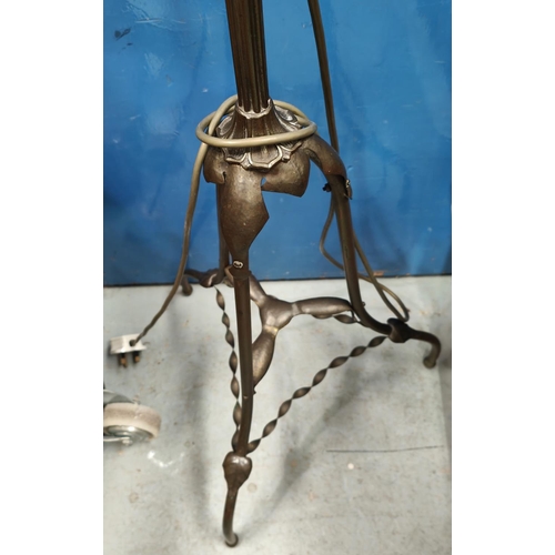 184 - An Arts and Crafts/ Art Nouveau brass standard lamp with fringed shade